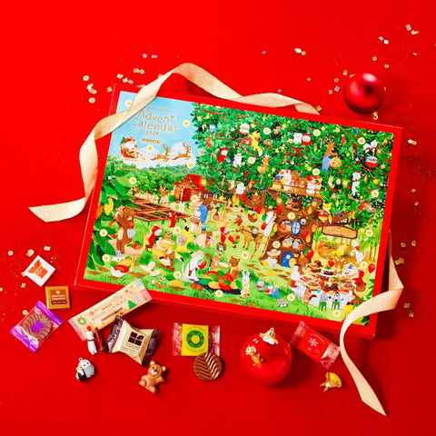 ROYCE' Chocolate - Advent Calendar - Image shows an Advent Calendar with illustrations of animals and a decorated tree in a farm. Text says Advent Calendar 2024. Accents include charms and different confections.