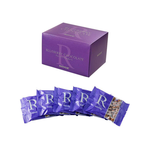 ROYCE' Chocolate - Blueberry Chocolate - Image shows a violet box on middle top and violet packs on middle bottom. Text says Blueberry Chocolate. ROYCE'.