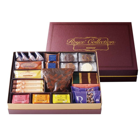 ROYCE' Chocolate - ROYCE' Chocolate "Brown" - ROYCE' Collection "Brown" with Prafeuille Chocolat "Orange" - Image shows on top right a brown box. Gold text says ROYCE' Collection ROYCE'. Below left is an open box with various individually-wrapped chocolates and confections in different shapes and colors. Background is in white.