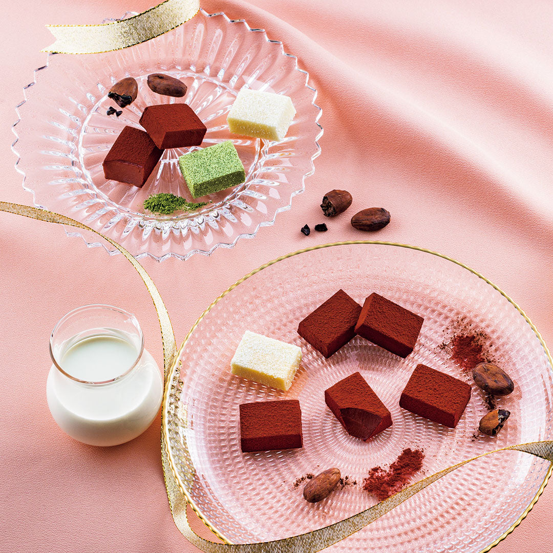 ROYCE' Prestige Nama Chocolate Collection - Image shows chocolate blocks on clear plates.