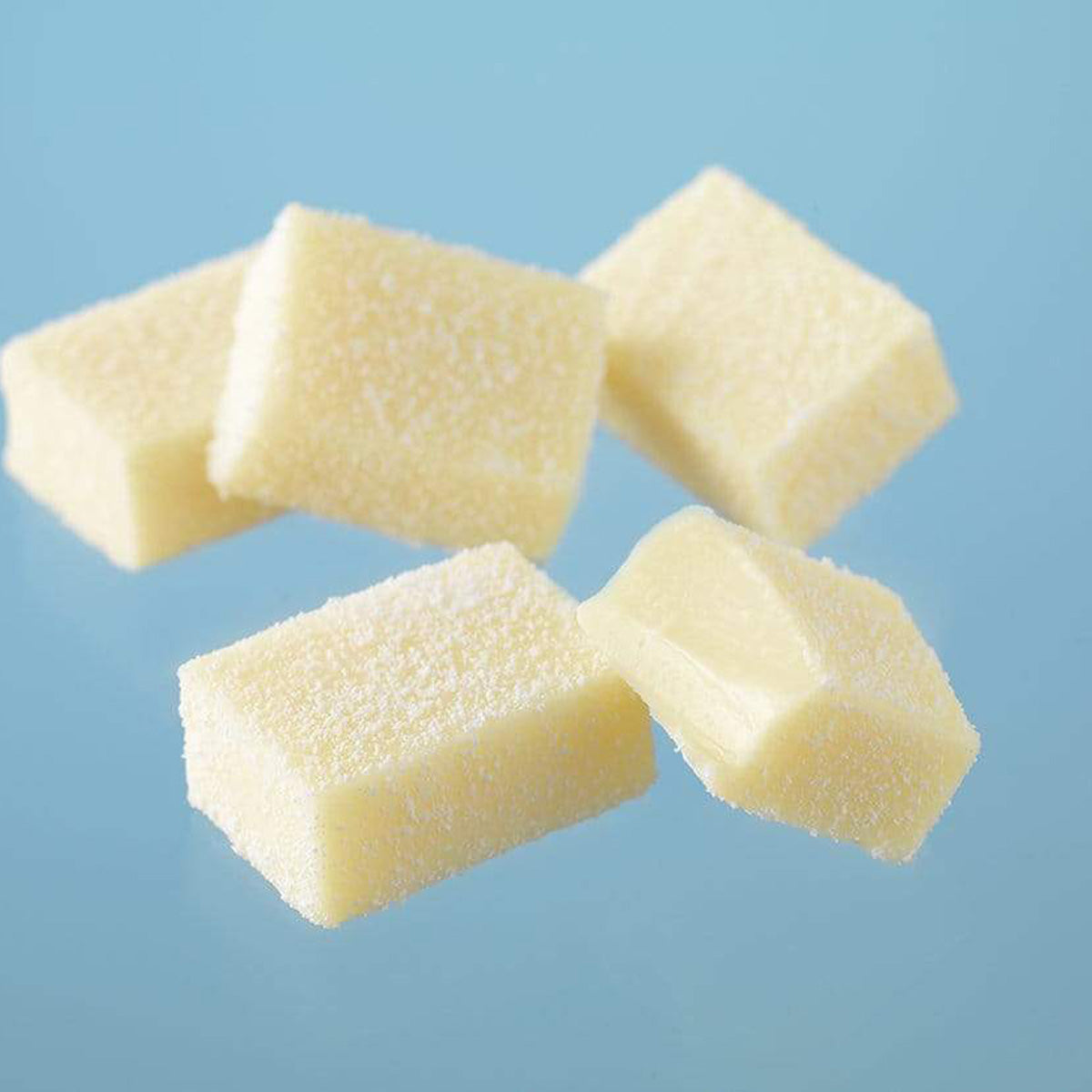 ROYCE' Chocolate - Nama Chocolate "White" - Image shows white blocks of chocolates with blue background.